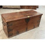 A 19th century mariner's chest with applied iron straps and carrying handles; the interior lined