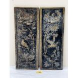 A pair of oriental bronze plaques, cast in relief with birds in branches. 16¼' x 6'