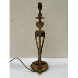 A gilt brass table lamp. 18½' high excluding fitting