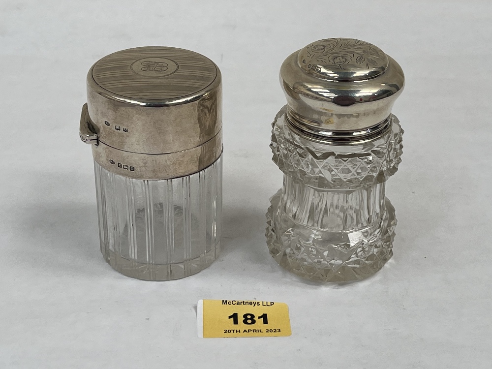 Two George V cut glass Cologne bottles with stoppers and silver lid or screw top. Birmingham 1911