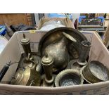 A box of brassware