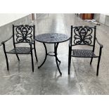 A three piece metal patio set