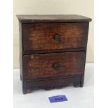 A 19th century miniature chest of two drawers. 6½'high