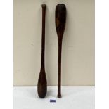 A pair of treen juggling clubs. 24' long