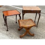 A walnut side table; a mahogany occasional table and an 'X' frame stool with caned seat (3)