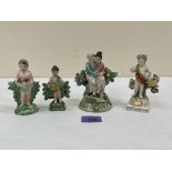 An early 19th century Staffordshire bocage figure group, 5' high (loss to bocage); together with