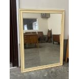A wall mirror with painted frame. 53' x 41'