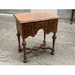 A William and Mary style walnut lowboy of recent manufacture. 24' wide