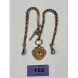 A 9ct Albert chain with suspended medallion. 16' long. 36g