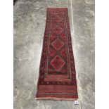 A Meshwani carpet runner. 2.4m x 0.6m