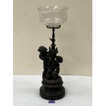 A 19th century speltar figural gas table lamp with cut glass and wheel engraved shade (rim chips).