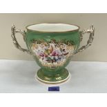 A 19th century two handled vase in Sevres style, painted in two reserves with summer flowers or