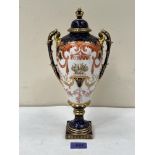 A Royal Crown Derby two handled inverted baluster vase and cover. Date code 1898. 12' high