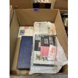 A box of mostly foreign stamps