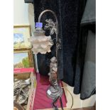 A resinous figural table lamp. 22' high