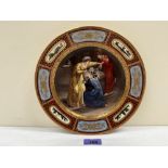 A 19th century Vienna plate painted with a mythological scene. Underglaze blue beehive mark. 9¾'