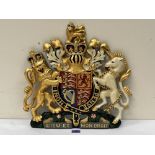 A painted metal royal armorial. 18½' high. Damaged