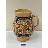 A Crown Ducal handled vase with tube-lined decoration by Charlotte Rhead. Signed. 10' high