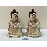 A pair of 19th century Staffordshire groups, seated lady with boy reading a book. 7' high