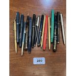 A collection of pens, three with 14ct nibs