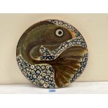A Puigmont (Spain) glazed earthenware fish charger. Signed. 14' diam