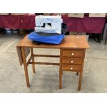 A Brother XL-5500 sewing machine with work table