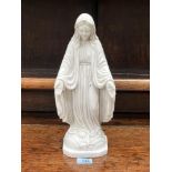 A reconstituted marble figure of The Virgin Mary. 14¼' high. Losses to fingers