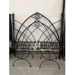 A 5' iron bedstead and a pair of matching bedside tables