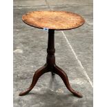 A 19th century oak tripod table of fine colour, the one piece top on turned support. 20¼' diam
