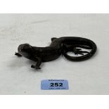 A Japanese bronze okimono of a lizard, the reptile with finely textured detail. 5½' long. Some loss