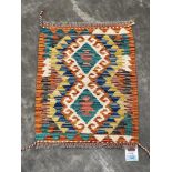 A Chobi Kilim small rug. 0.57m x 0.45m