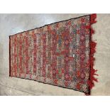 A Moroccan Kilim carpet. 92' x 48'