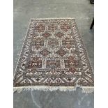 A Turkish cream ground carpet 90' x 59'