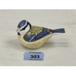 A Royal Crown Derby Garden Blue Tit paperweight with gold stopper. 4' long