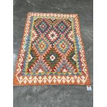 A Chobi Kilim rug. 1.58m x 1.07m