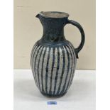 A stoneware pottery jug by Pauline Paterson of the Black Mountain Pottery, Brecon. Signed initials