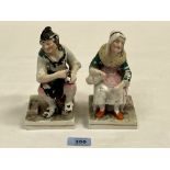 A pair of 19th century Staffordshire figures of a rustic with female companion. 6½' high. Glaze
