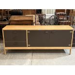 A modernist teak and lacquered sideboard designed by Gordon Russell. 72' wide