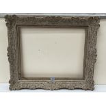 A parcel gilt gesso picture frame. Aperture 20' x 25'