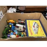 A box of diecast model vehicles with empty Matchbox Series collector's case