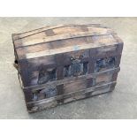 A domed lid chest. 30' wide. Distressed