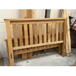 A 5' light oak bedstead