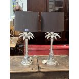 A pair of metal palm tree table lamps. 17' high excluding fitting