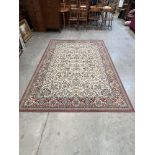 A cream ground wool carpet. 114' x 80'