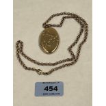 A 9ct locket on 9ct necklet chain. 20g