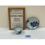 A Nanking cargo tea bowl and saucer. Bears Christies label no. 5109 to base