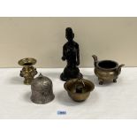 Four items of oriental metalware with a carved ethnic figure