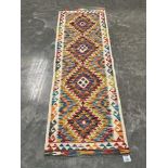 A Chobi Kilim carpet runner. 2.05m x 0.67m