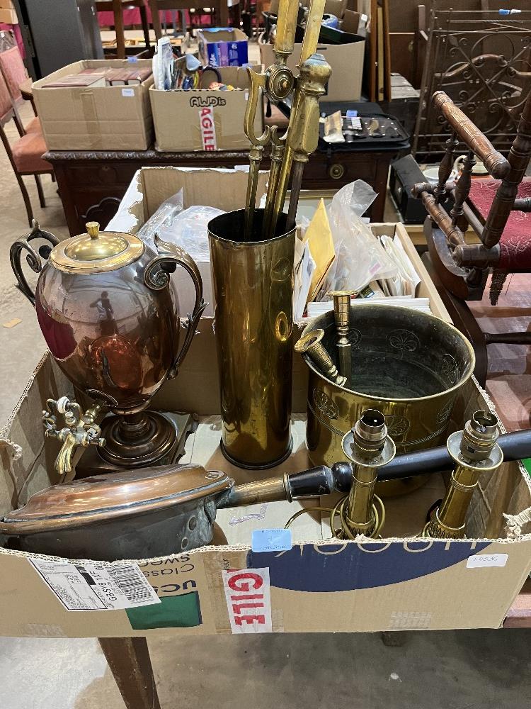 A copper samovar; a pair of brass candlesticks and other brass and copperware