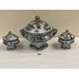 A Victorian soup tureen and cover with a pair of sauce tureens en-suite. The soup tureen 13' wide